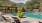 lounge chairs next to pool