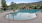 a swimming pool with mountain views