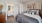 carpeted bedroom and private bath