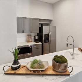 a kitchen with serving counter