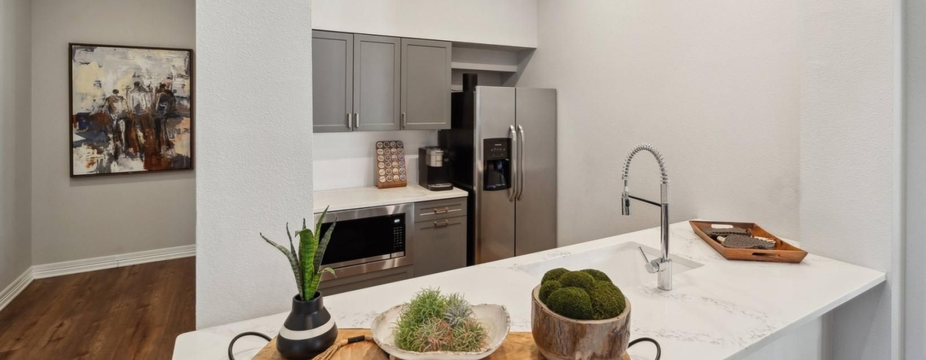 a kitchen with serving counter